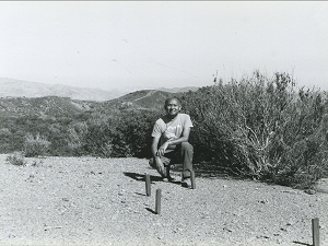 Dinesh with stakes on the ground